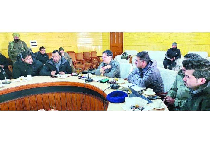 Deputy Commissioner (DC) Baramulla, Minga Sherpa chairing review meeting on Wednesday.