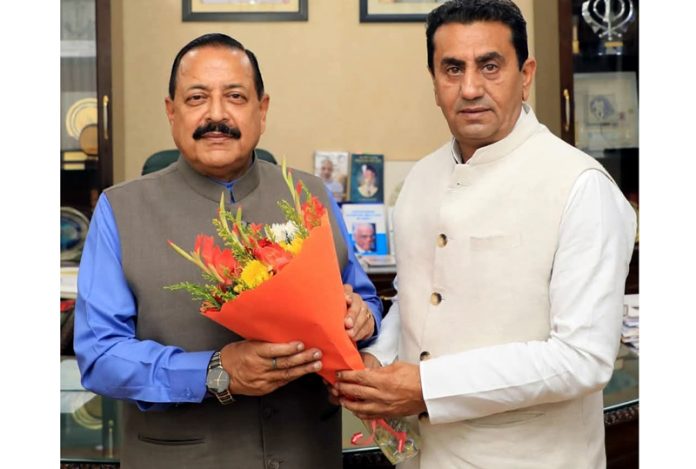 MLA Jasrota, Rajiv Jasrotia presenting a flower bouquet to Dr Jitendra Singh at New Delhi on Wednesday.