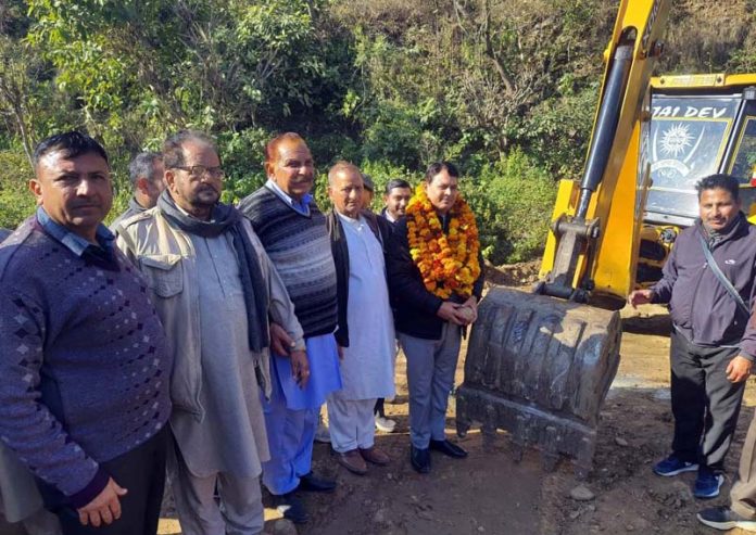 DDC Suresh Sharma kick starting road work in Kathar Panchayat of Maira Mandrian.