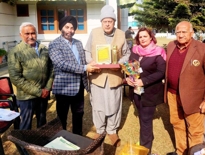 Dr Farooq Abdullah meeting with a delegation in Jammu on Tuesday.