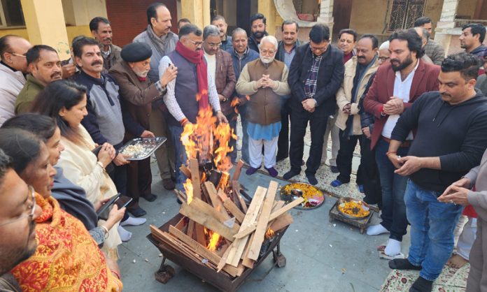 Members of Sanatan Dharam Sabha celebrating Lohri at Geeta Bhawan Jammu on Monday. — Excelsior/Rakesh