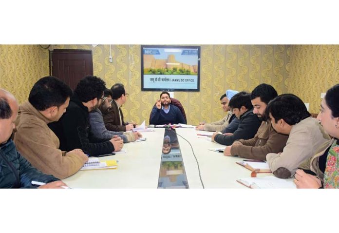 DC Sachin Kumar chairing a meeting at Jammu on Thursday.