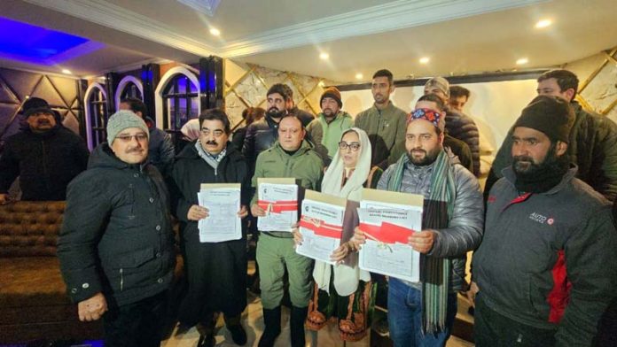 BJP leaders during party's active membership drive at Srinagar on Saturday.