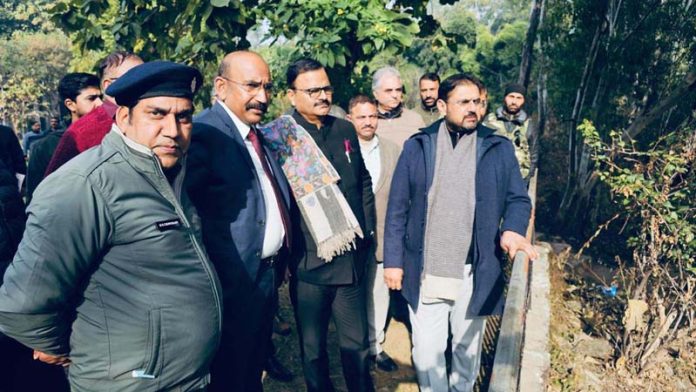 Minister Javed Ahmed Rana reviewing water supply scheme during visit to Akhnoor Constituency.