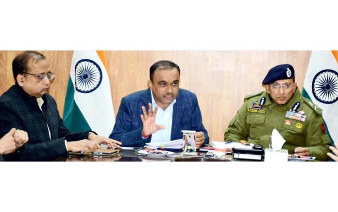 Div Com Jammu Ramesh Kumar & ADGP Jammu Anand Jain chairing a meeting on Thursday.