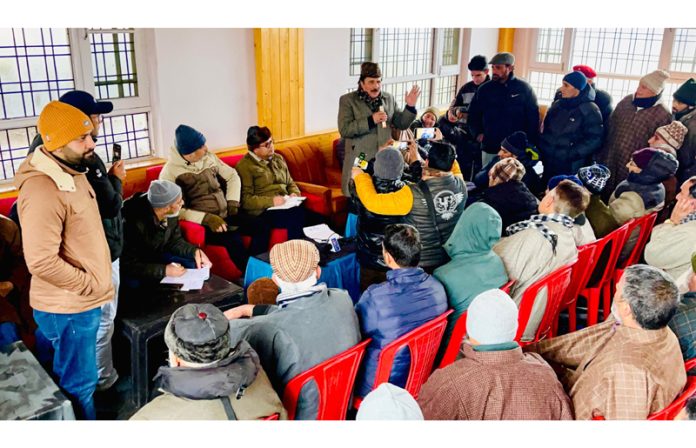 MLA Eidgah, Mubarak Gul and other party functionaries during a public darbar at Gassi Mohalla, Safakadal.