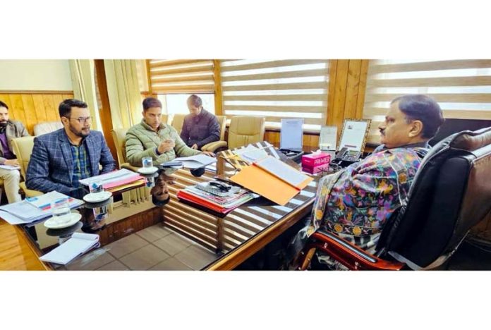 Minister Javed Ahmad Rana chairing a meeting at Jammu on Wednesday.