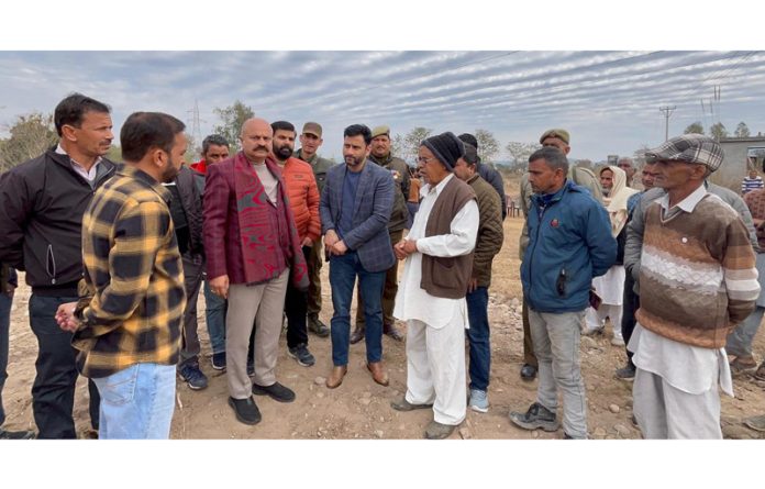 MLA East, Yudhvir Sethi with Revenue officers and locals residents at Bain Bajalta to get encroached land retrieved on Thursday.