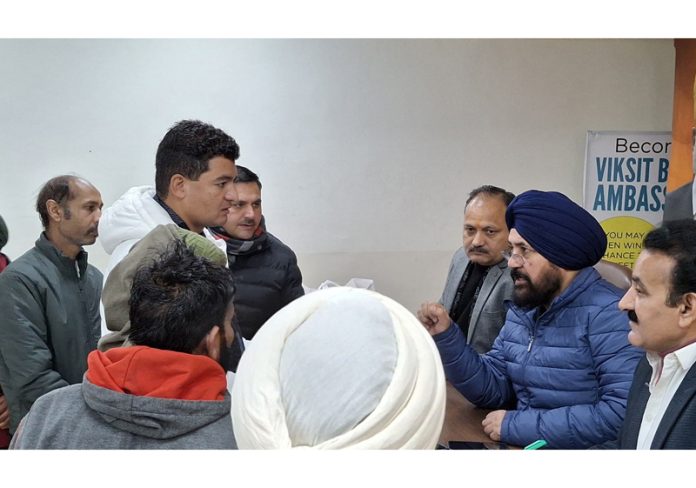 BJP MLA Jammu South Dr Narinder Singh listening public grievances at party office Trikuta Nagar on Wednesday.