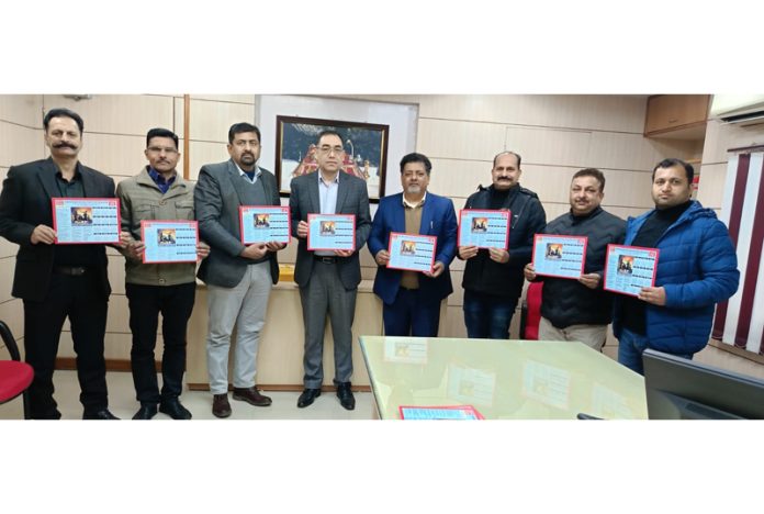 Sonam Chhewang, Sr. Div Manager LIC Srinagar Div releasing NZIEA calendar on Wednesday.