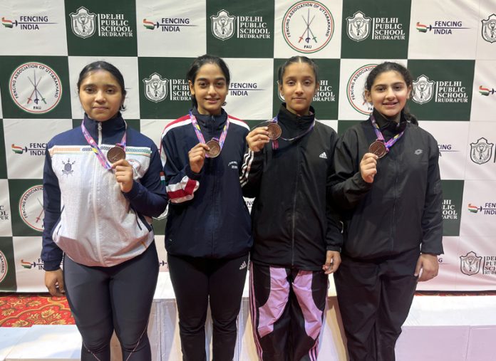 J&K Fencers posing with their medals at the 19th Cadet National Fencing Championship in Rudrapur, Uttarakhand.