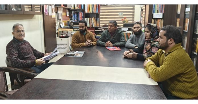 Senior BJP leader, Kavinder Gupta interacting with people during a public darbar in Jammu on Saturday.