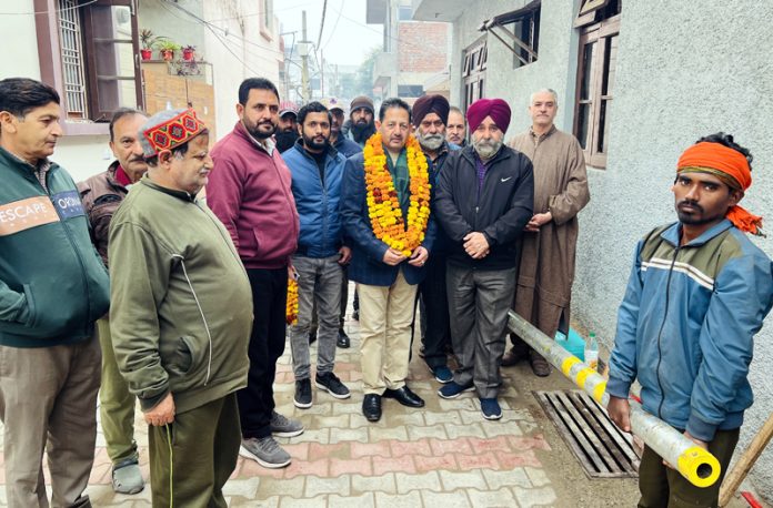 Former Dy Mayor, Baldev Singh Billawaria kick starting laying of drinking water pipe line in Gangyal on Tuesday.