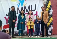 Students posing with trophies during prize distribution ceremony at Jammu.