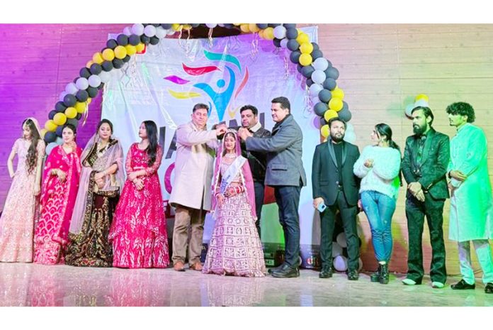 Dignitaries posing alongside participants during the Jammu Youth Festival.