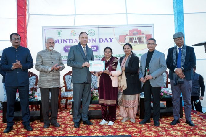 Vice Chancellor of SKUAST-K, Prof. Nazir Ahmed Ganai felicitating an innovative woman entrepreneur of KVK Reasi during the celebration of Foundation Day of ICAR-ATARI in Ludhiana.