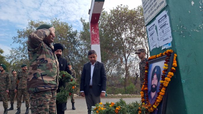 MLA Kathua, Dr Bharat Bhushan, and army officers paying tribute to Martyr NK Piar Singh in his native village Kukey Chack on Tuesday.