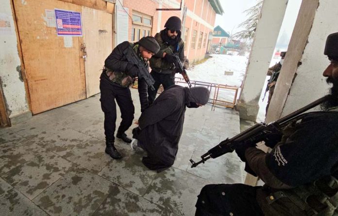 Mock drill being conducted at Amargarh Railway Station in Sopore.