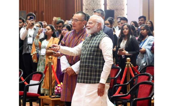 Prime Minister Narendra Modi with Prime Minister of Bhutan Tshering Tobgay inaugurating the 'School of Ultimate Leadership Conclave', in New Delhi on Friday. (UNI) Prime Minister Narendra Modi with Prime Minister of Bhutan Tshering Tobgay inaugurating the 'School of Ultimate Leadership Conclave', in New Delhi on Friday. (UNI)