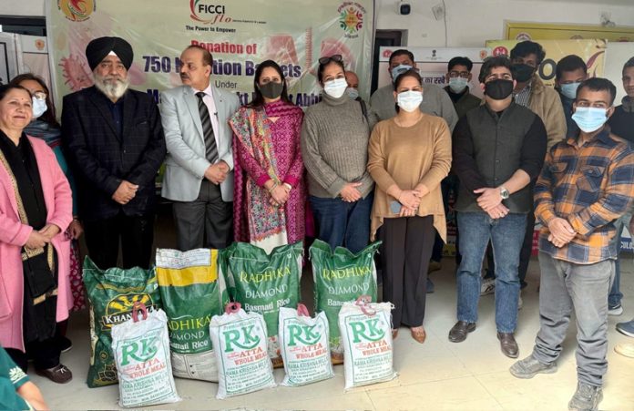 FICCI FLO members distributing nutrition kits among active TB patients in Jammu.