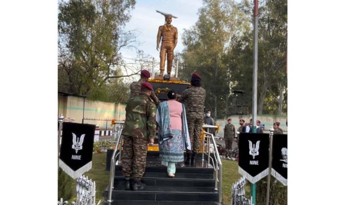 Floral tribute being paid to Captain Tushar on his martyrdom day on Friday.