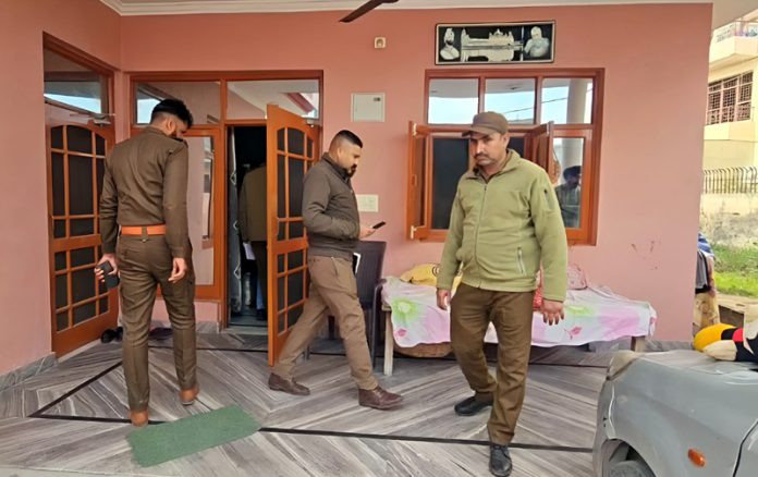 A police team investigating the crime spot at Nanak Nagar area. — Excelsior /Rakesh