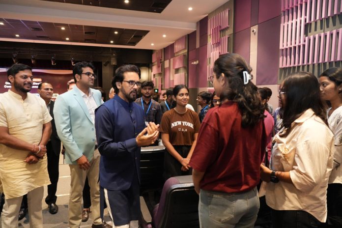 Anurag Thakur interacting with students at Parul University in Vadodara.