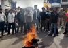 People staging protest by burning tyres on Jarai Road in Kathua. —Excelsior/Pardeep