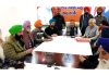 Members of a Sikh deputation in a meeting with J&K BJP chief Sat Sharma and general secretary Ashok Koul.