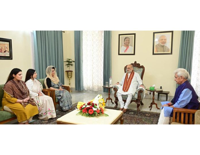 Family members of late Devender Singh Rana, former MLA Nagrota meeting Union Home Minister Amit Shah at Raj Bhawan, Jammu. Family members of late Devender Singh Rana, former MLA Nagrota meeting Union Home Minister Amit Shah at Raj Bhawan, Jammu.