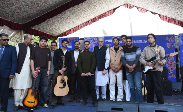 CM Omar Abdullah and others at Badamwari, Srinagar on Friday. -Excelsior/Shakeel