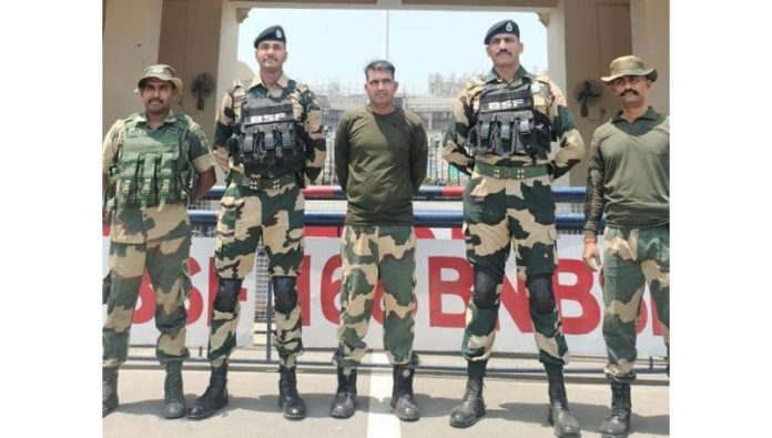 BSF jawan Purnam Kumar Shaw, who had been in the custody of Pakistan Rangers since April 23, was handed over to India at the Attari-Wagah border front in Punjab on Wednesday. BSF jawan Purnam Kumar Shaw, who had been in the custody of Pakistan Rangers since April 23, was handed over to India at the Attari-Wagah border front in Punjab on Wednesday.