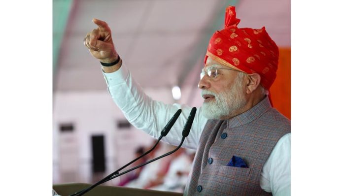 Prime Minister Narendra Modi addresses a public rally in Bikaner on Thursday. (UNI)