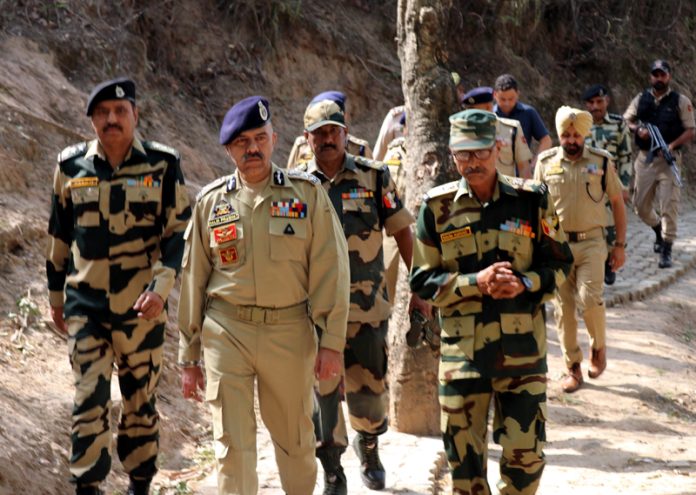DGP Nalin Prabhat inspecting a forward post along with BSF and JKP personnel in Jammu on Friday.
