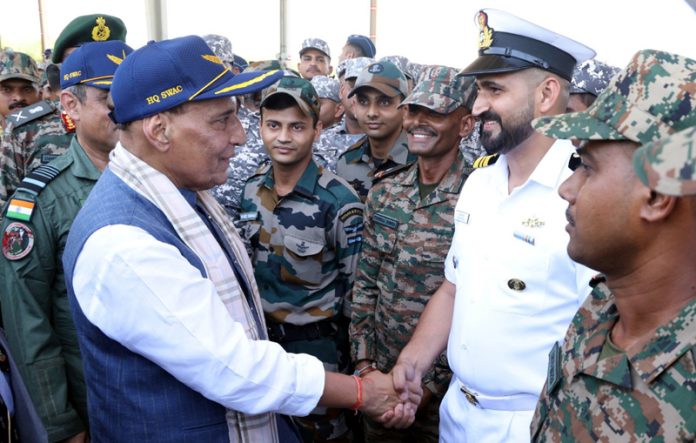 Defence Minister Rajnath Singh interacting with soldiers at Bhuj Air Force Station in Gujarat on Friday. (UNI) Defence Minister Rajnath Singh interacting with soldiers at Bhuj Air Force Station in Gujarat on Friday. (UNI)