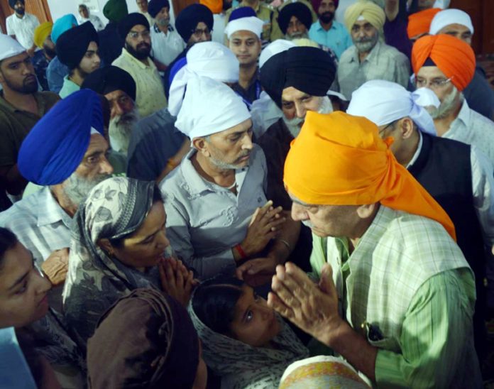 LG Manoj Sinha meeting people in Gurudwara at Poonch on Wednesday.