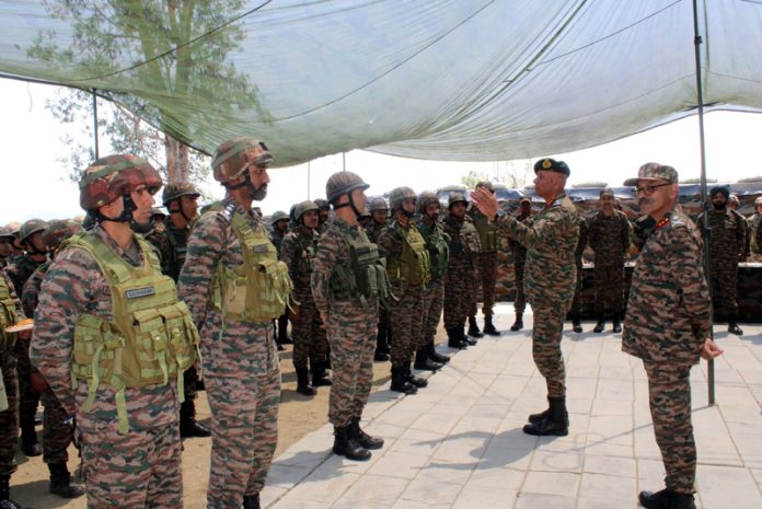 Northern Command chief Lt Gen Pratik Sharma interacting with troops on LoC.