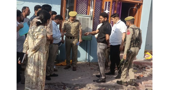 DC Jammu meeting people of shelling affected area on Tuesday.