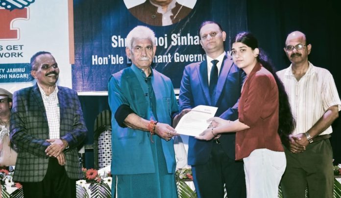 LG Manoj Sinha handing over job letter to a girl in Jammu.