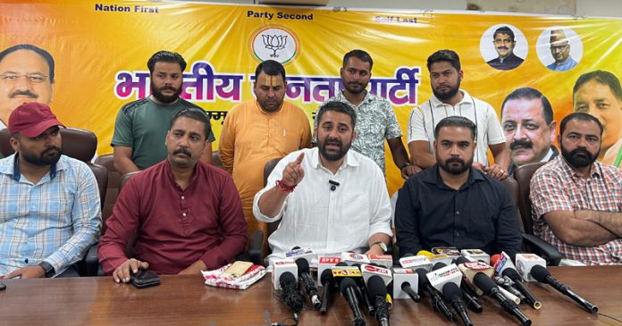 BJYM J&K president Arun Prabhat addressing press conference at party office in Jammu on Sunday.