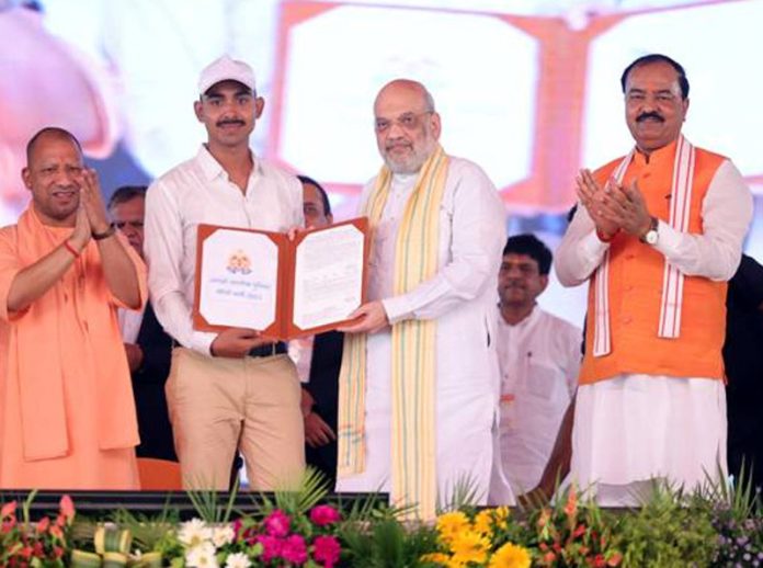 Union Home Minister Amit Shah distributing appointment letters in Lucknow, Uttar Pradesh on Sunday.