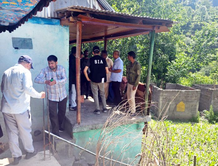 An SIA team searching a house in Poonch. —Excelsior/Waseem