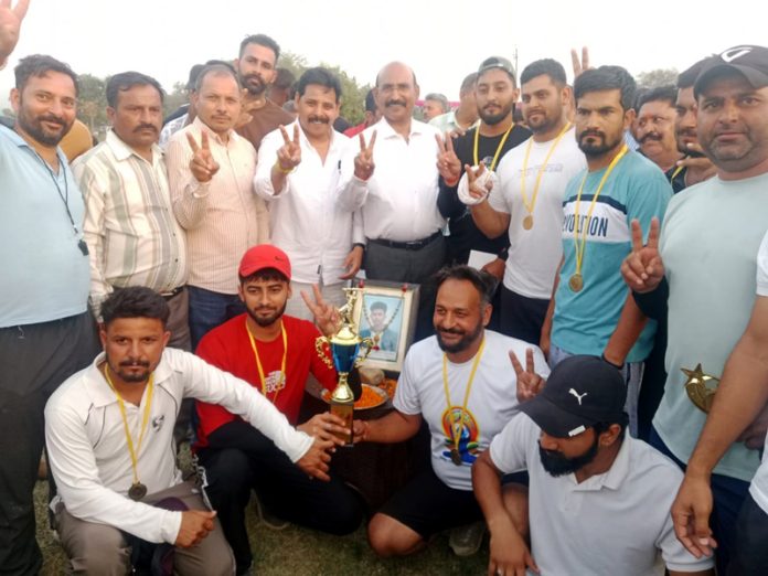 MLA Akhnoor, Mohan Lal Bhagat along with others after presenting trophies to the winner and runner-up cricket teams. MLA Akhnoor, Mohan Lal Bhagat along with others after presenting trophies to the winner and runner-up cricket teams.