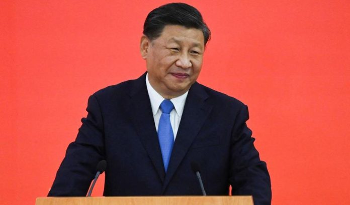 Chinese President Xi's move to share power fuels speculation about his political future