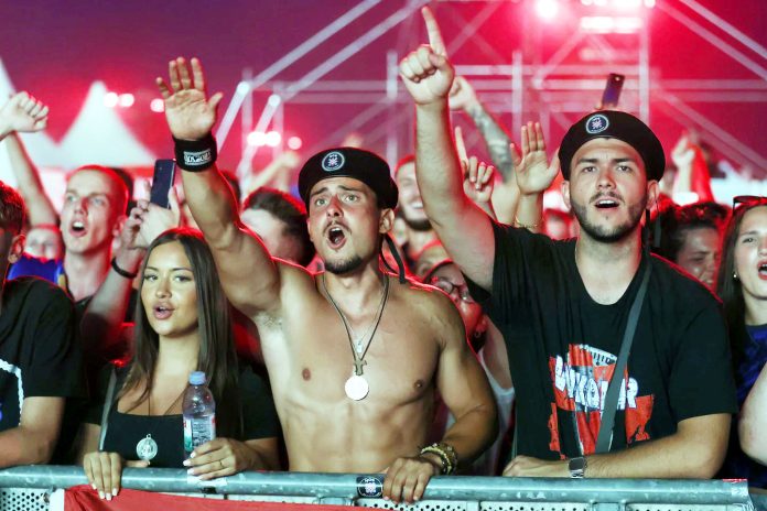 Croatian right-wing singer Marko Perkovic,  fans perform pro-Nazi salute at massive concert
