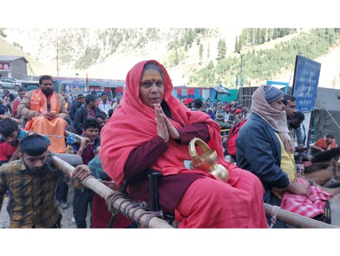 Pilgrims head for Shri Amarnath Ji cave shrine from Baltal on Saturday. -Excelsior/Firdous