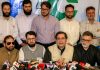 PC president Sajjad Gani Lone along with other leaders during a press conference in Srinagar on Monday.