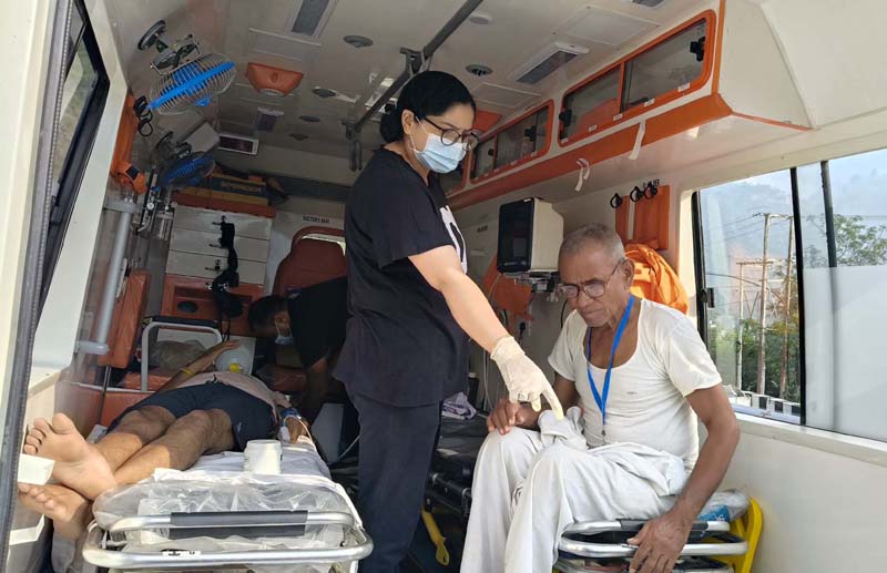 Medical team providing treatment to the injured pilgrims in an ambulance at Ramban on Saturday.