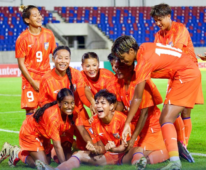 Indian Women’s Football team celebrating after defeating Thailand in Chiang Mai.