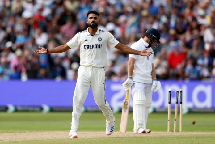 Akash Deep celebrating after taking a wicket against England in Birmingham.